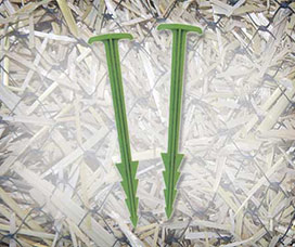 Biodegradable stakes for erosion matting